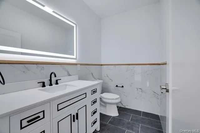 a bathroom with a sink and a toilet