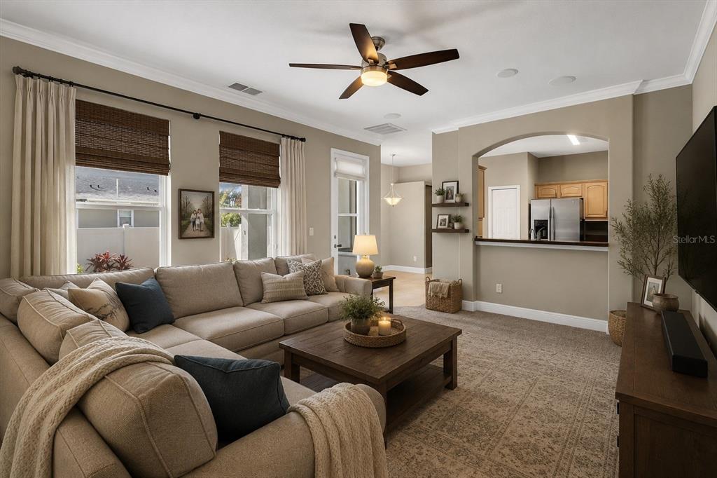10121 Porch Street New Port Richey, FL 34655 - Photo 51 of 57 a living room with furniture and a flat screen tv