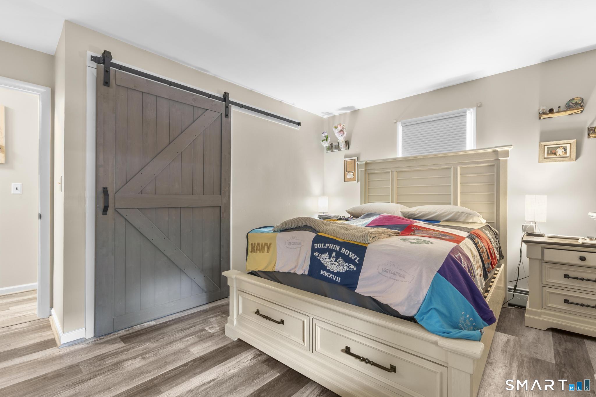 13 Christy Hill Road Ledyard, CT 06335 - Photo 22 of 38 a bedroom with a bed and a dresser
