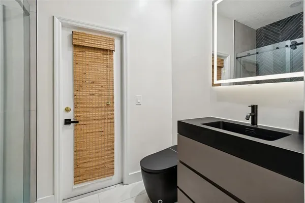 a view of outdoor space with wooden fence