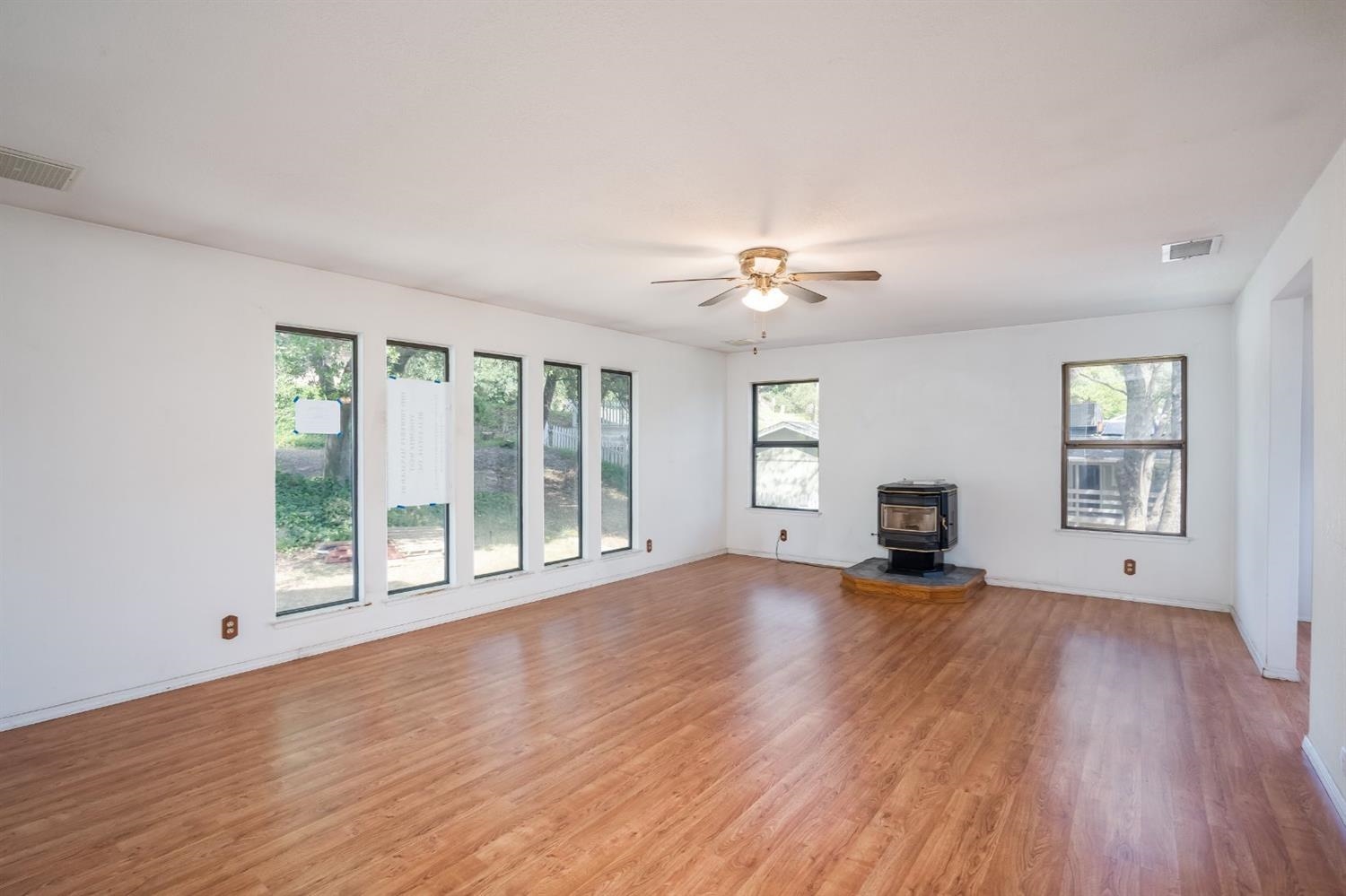 42368 Buckeye Road Oakhurst, CA 93644 - Photo 10 of 38 Living room includes pellet stove.