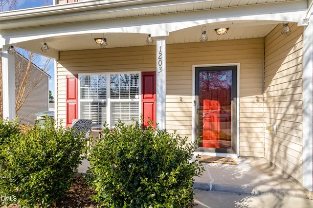 a front view of a house with a garage
