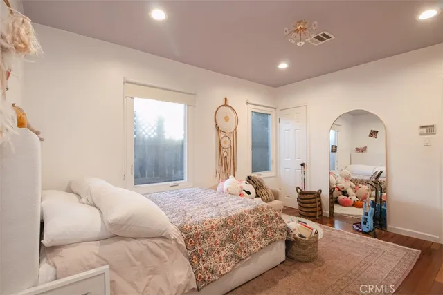 a bathroom with a sink vanity and mirror