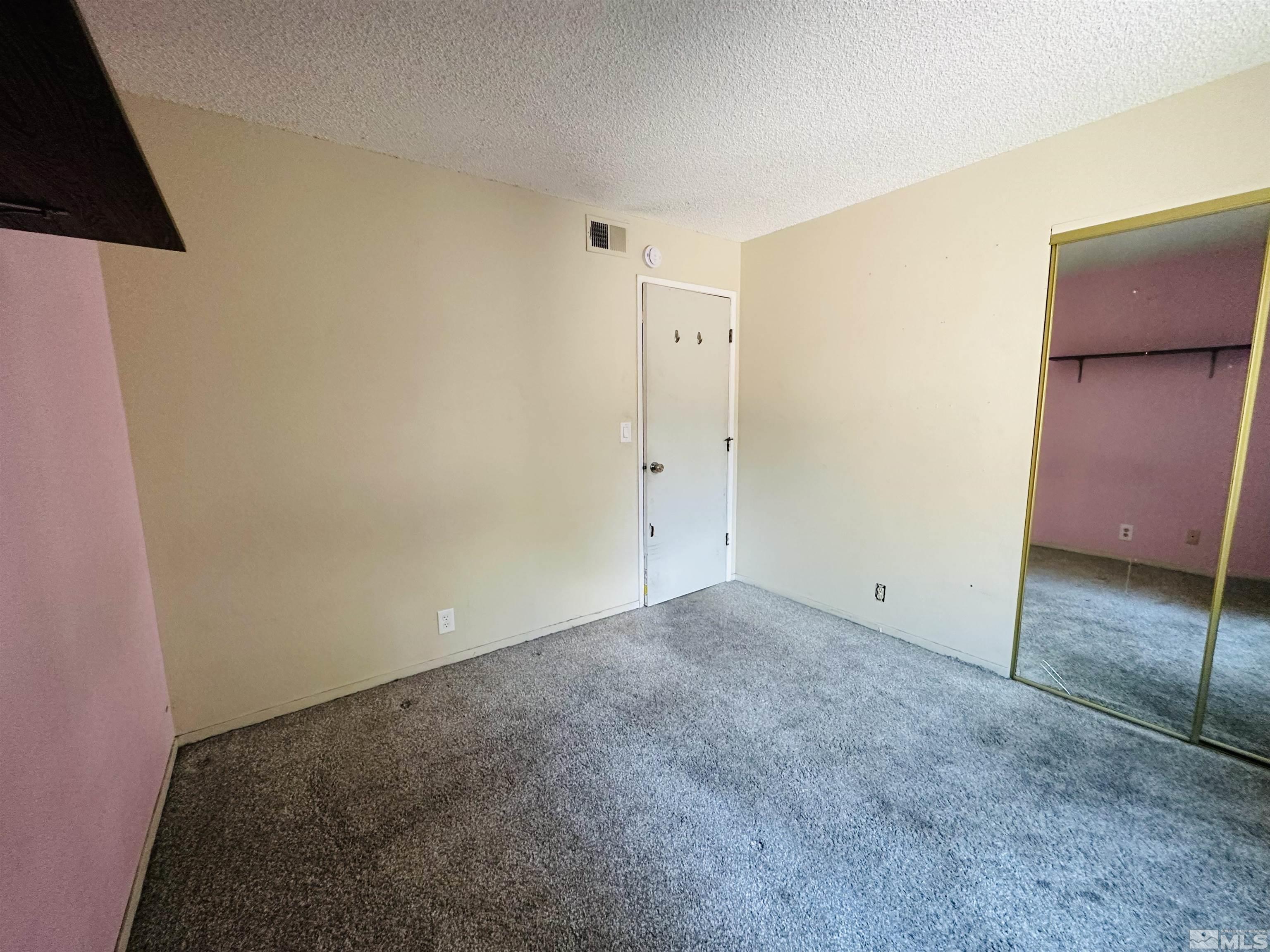 32 Castle Way Carson City, NV 89706 - Photo 8 of 16 a view of an empty room