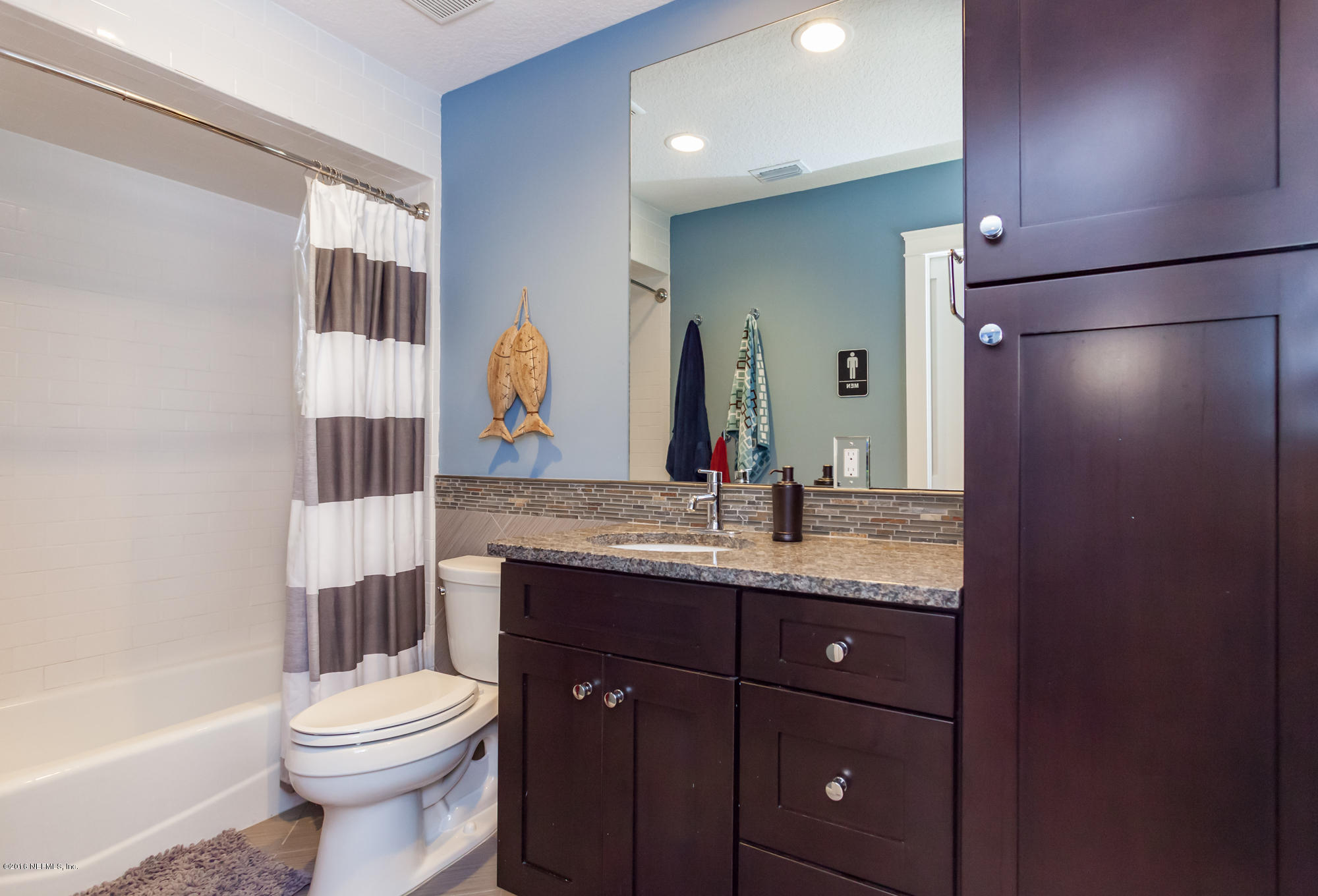 315 Pablo Road Ponte Vedra Beach, FL 32082 - Photo 35 of 51 a bathroom with a granite countertop sink toilet and shower