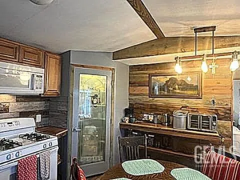 a living room with granite countertop shelf