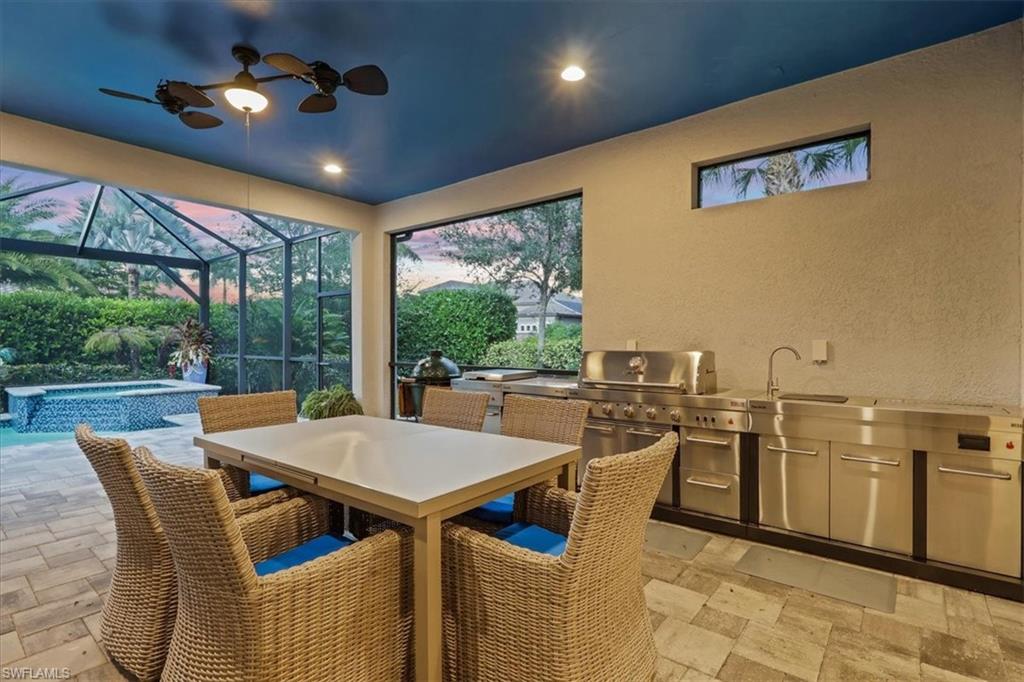 3221 Quilcene Lane Naples, FL 34114 - Photo 34 of 42 a view of a dining room with furniture window and outside view