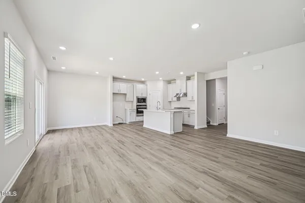 a view of kitchen with wooden floor
