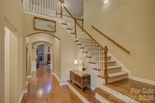 a view of entryway with wooden floor