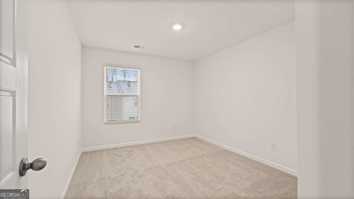 364 Sound Circle Stockbridge, GA 30281 - Photo 29 of 47 an empty room with a window