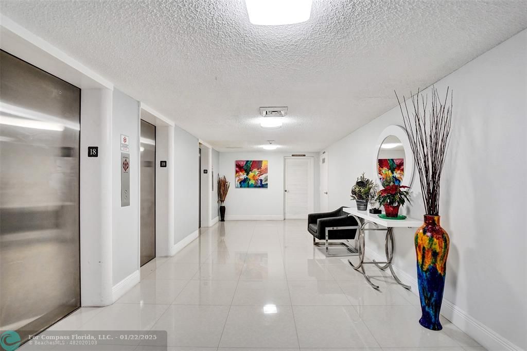 1600 South Ocean Drive, Unit 18B Hollywood, FL 33019 - Photo 26 of 36 a view of a hallway with workspace and a window