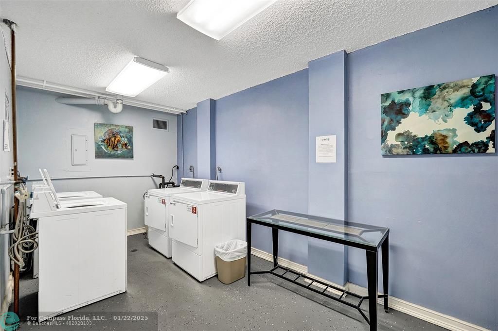 1600 South Ocean Drive, Unit 18B Hollywood, FL 33019 - Photo 29 of 36 a utility room with dryer and washer