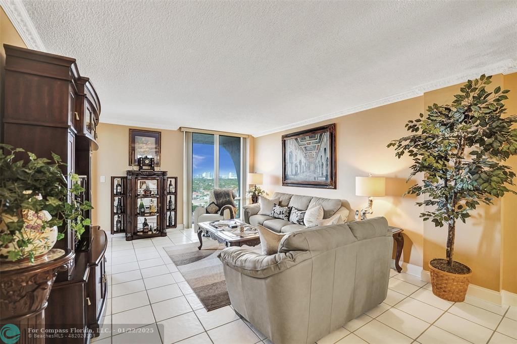 1600 South Ocean Drive, Unit 18B Hollywood, FL 33019 - Photo 5 of 36 a living room with furniture and a potted plant