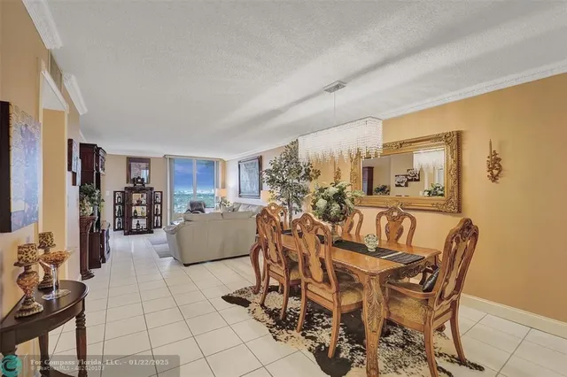 a view of a dining room with furniture and a livingroom