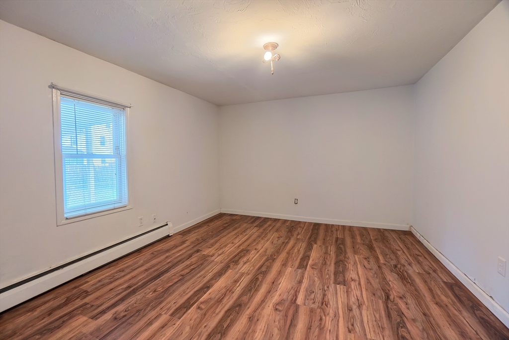 201 Stone Street Clinton, MA 01510 - Photo 21 of 42 wooden floor in a empty room