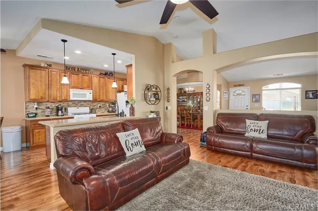 a living room with a table and a window