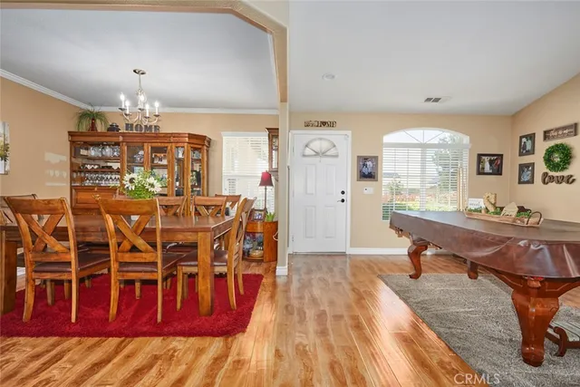 a bathroom with a double vanity sink toilet and shower