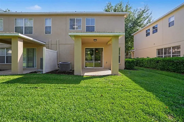 a view of a house with backyard