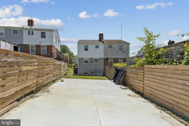a view of a street with houses
