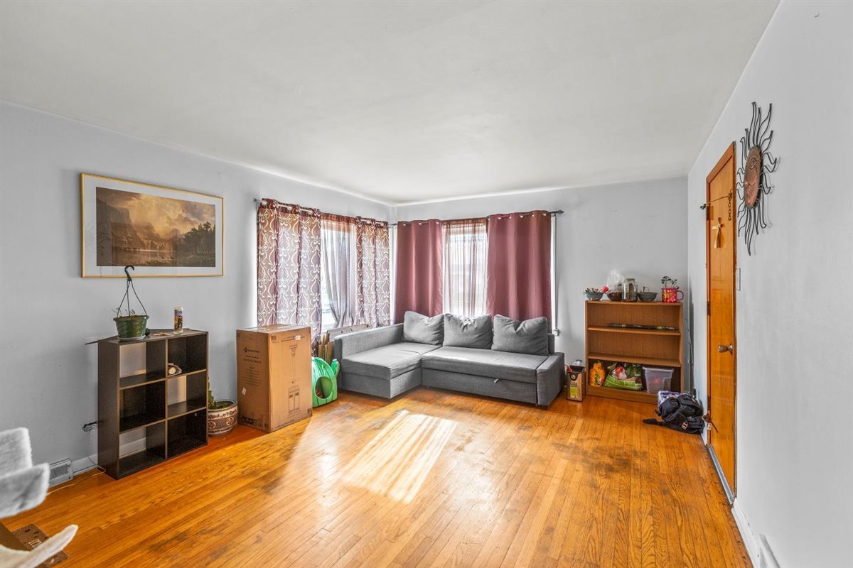 10619 Mason Avenue Chicago Ridge, IL 60415 - Photo 5 of 29 a bedroom with a bed and furniture