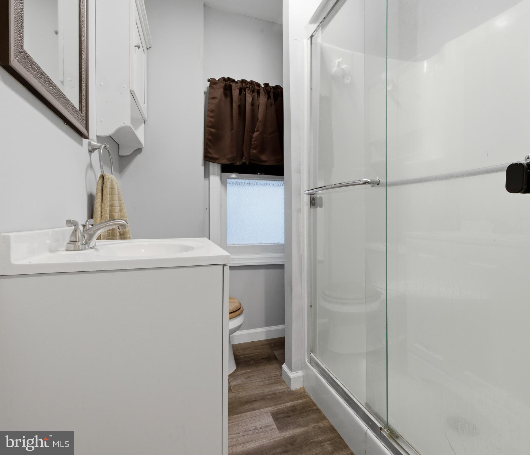 206 West 5th Avenue Runnemede, NJ 08078 - Photo 11 of 14 a bathroom with a sink and mirror