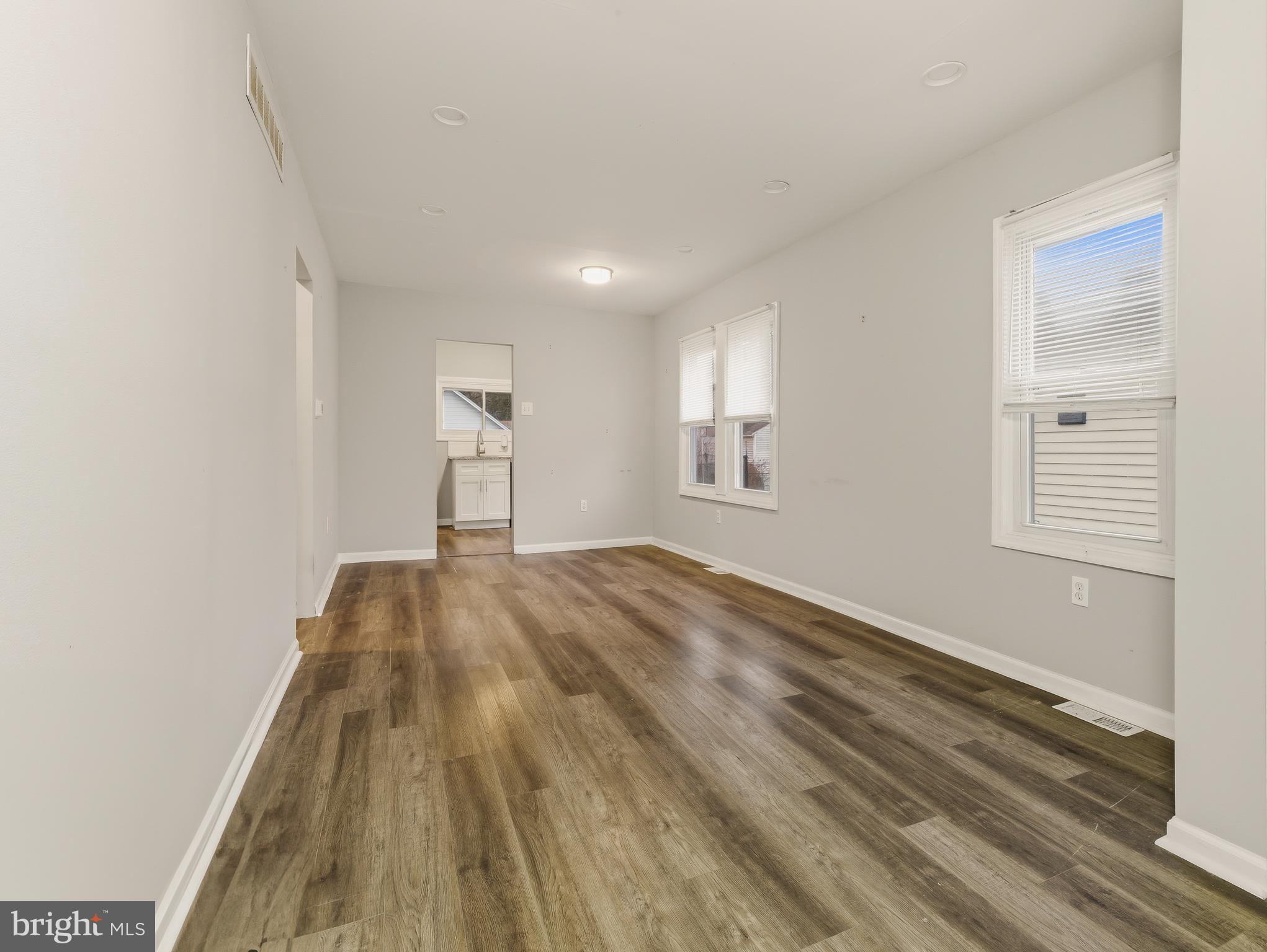 206 West 5th Avenue Runnemede, NJ 08078 - Photo 8 of 14 a view of empty room with wooden floor