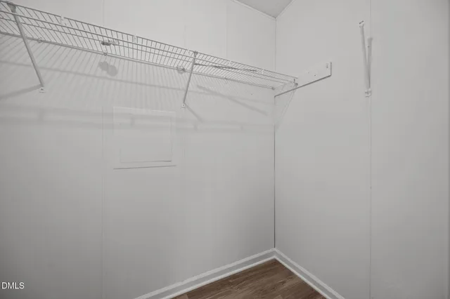 a view of a room with racks on the wall