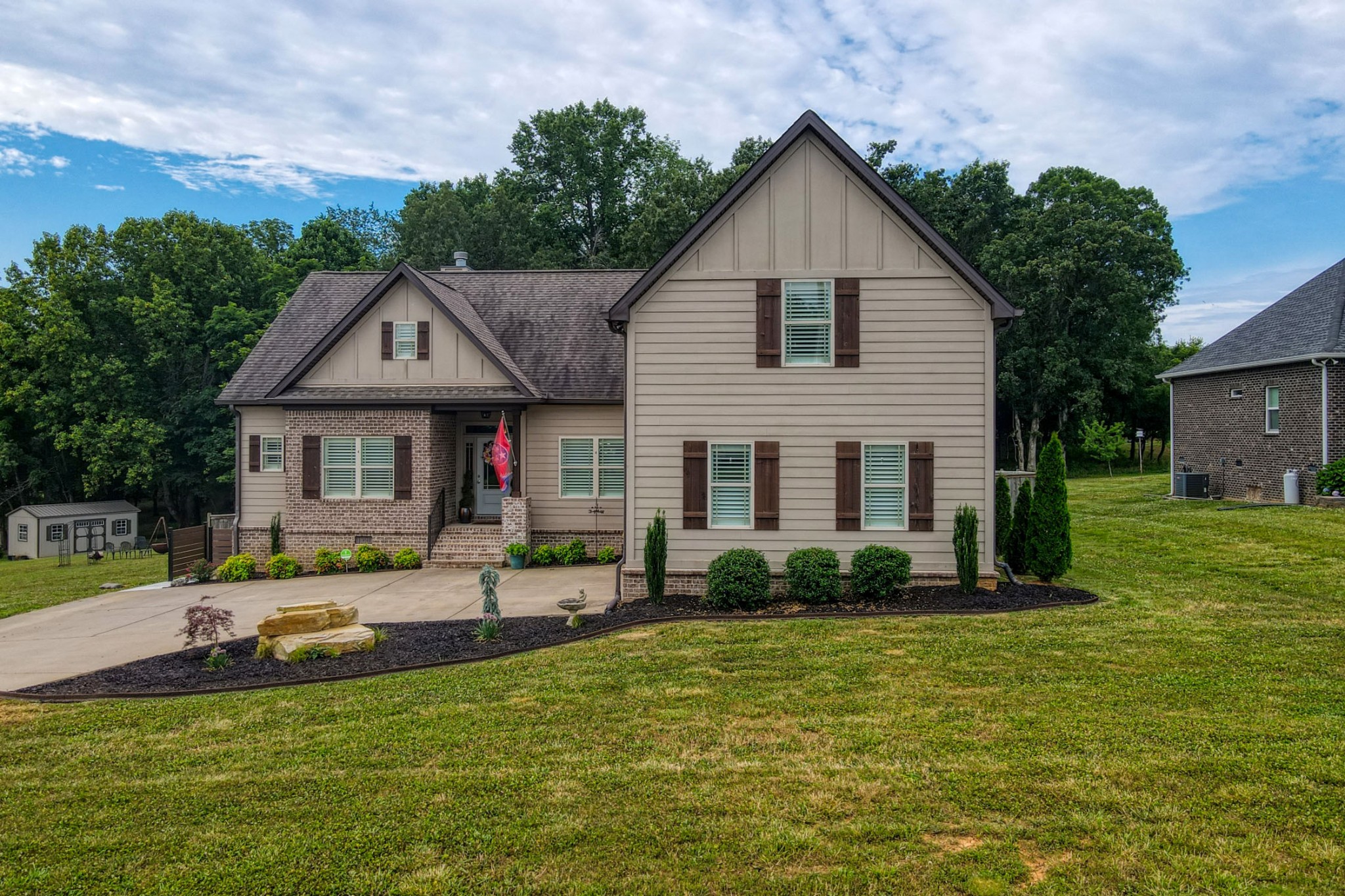 425 Tom Link Road Cottontown, TN 37048 - Photo 54 of 63 a front view of house with yard and green space