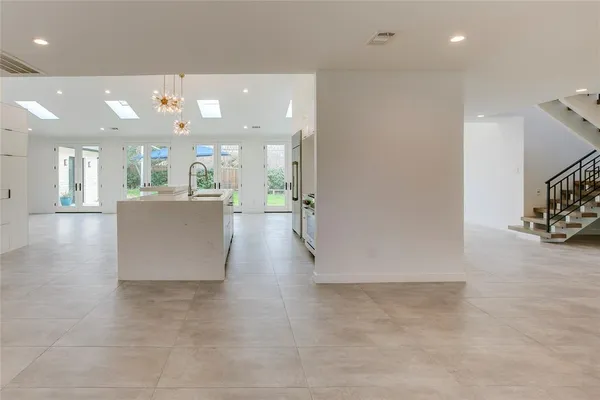 a view of a kitchen and a window
