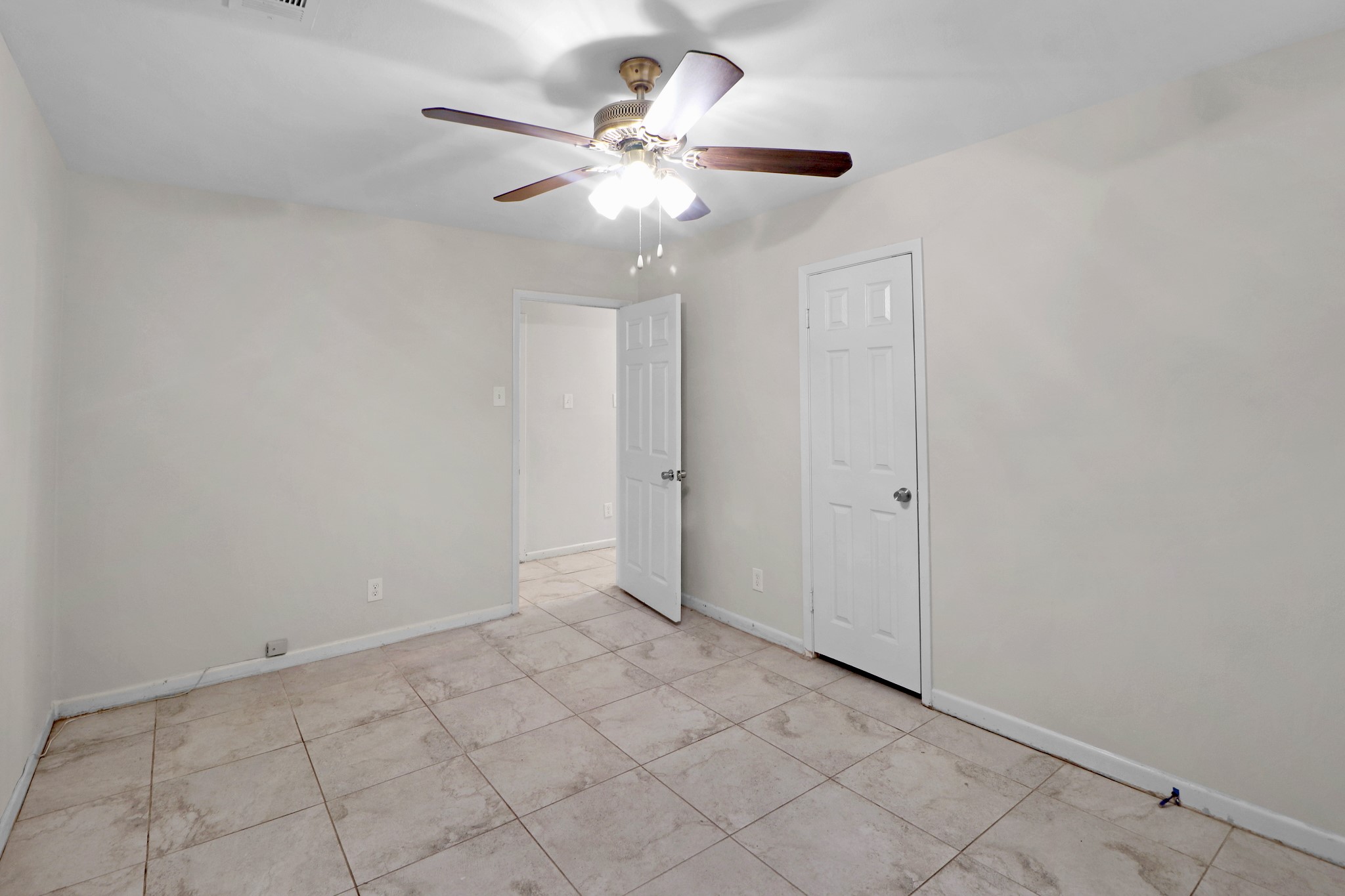 5554 Beechnut Street Houston, TX 77096 - Photo 21 of 30 a view of an empty room