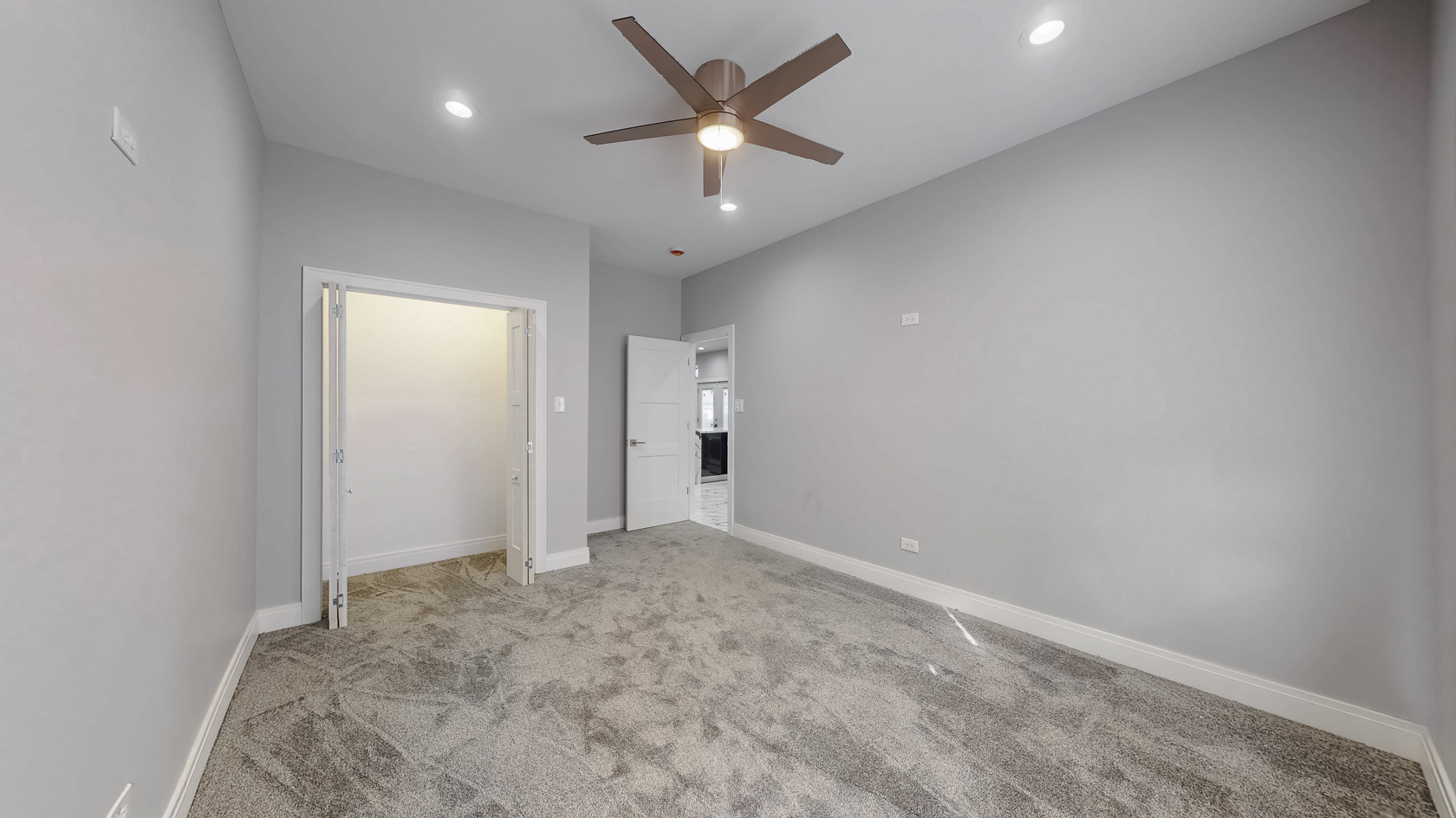 2347 Walnut Street Blue Island, IL 60406 - Photo 15 of 20 an empty room with a ceiling fan and a window