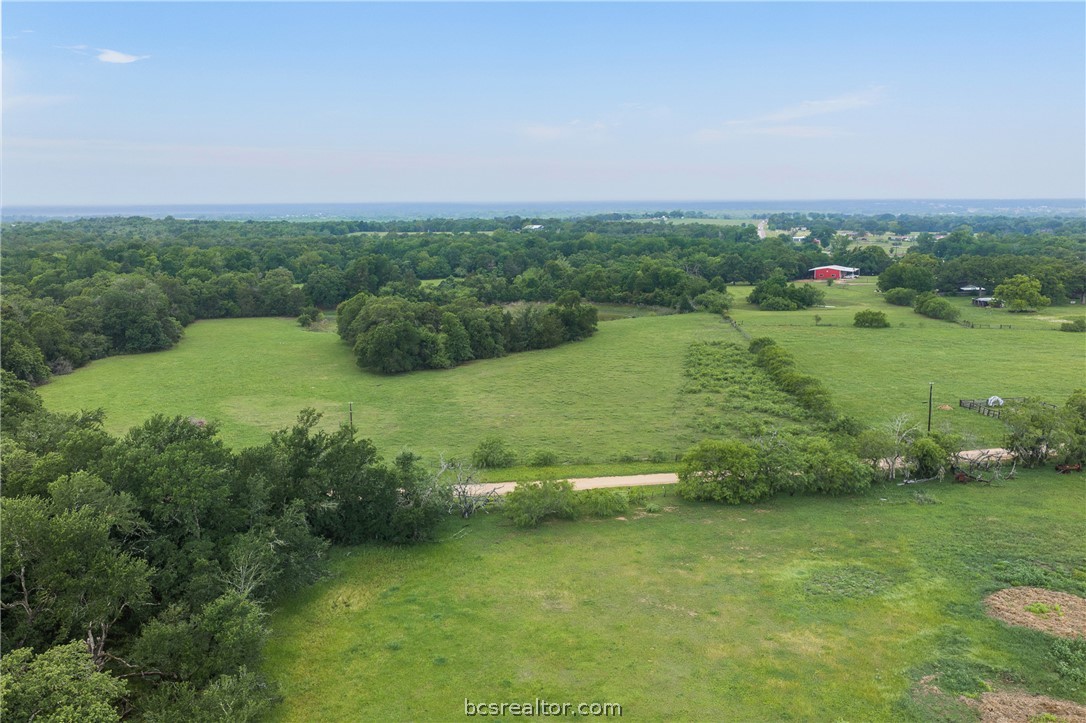 2095 & Prairie Cameron, TX 76520 - Photo 15 of 27 an aerial view of green landscape with trees houses and lake view