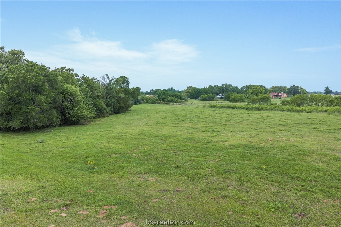 2095 & Prairie Cameron, TX 76520 - Photo 27 of 27 a view of a field with an ocean and trees in the background
