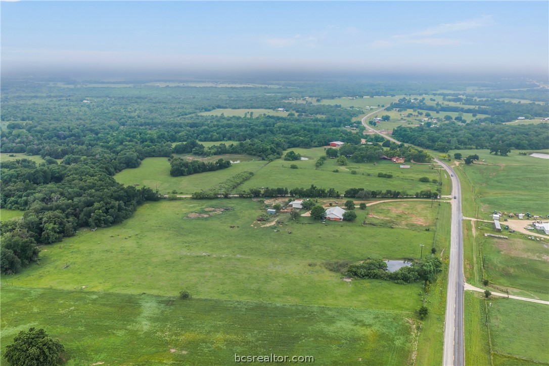 2095 & Prairie Cameron, TX 76520 - Photo 3 of 27 an aerial view of residential houses with outdoor space and trees