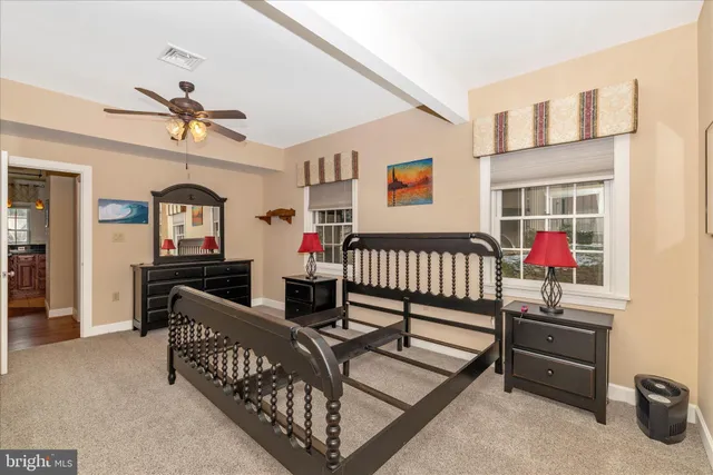 a view of a chairs and table in the balcony