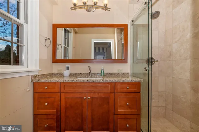 a view of a chairs and table in the balcony