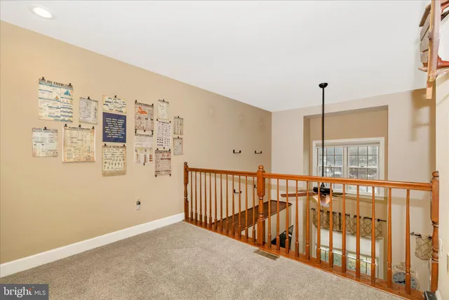 a kitchen with granite countertop a sink and a stove top oven