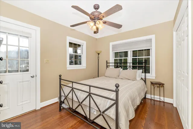 a bathroom with a double vanity sink and mirror
