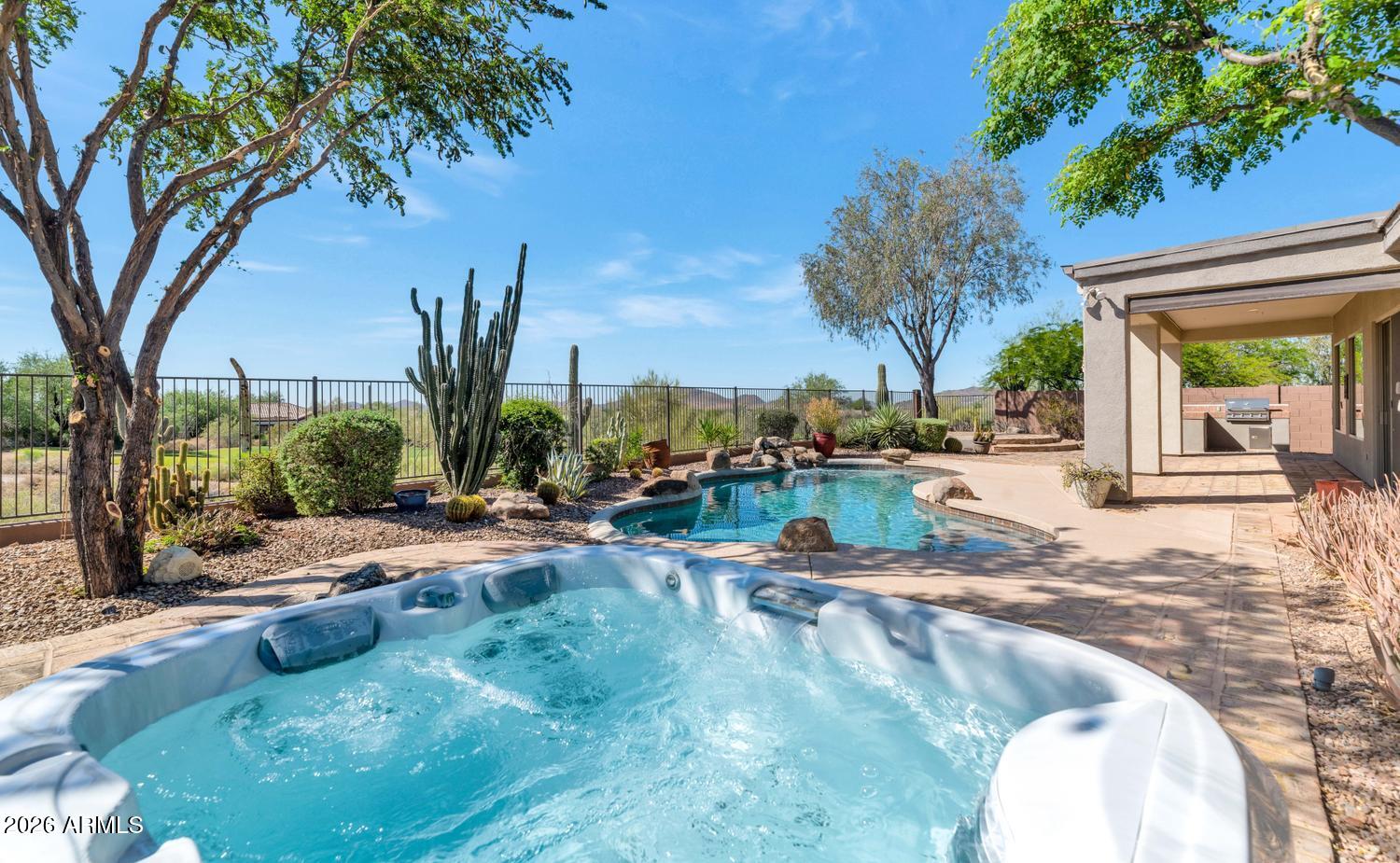 41123 North River Bend Road Phoenix, AZ 85086 - Photo 2 of 45 a view of a backyard