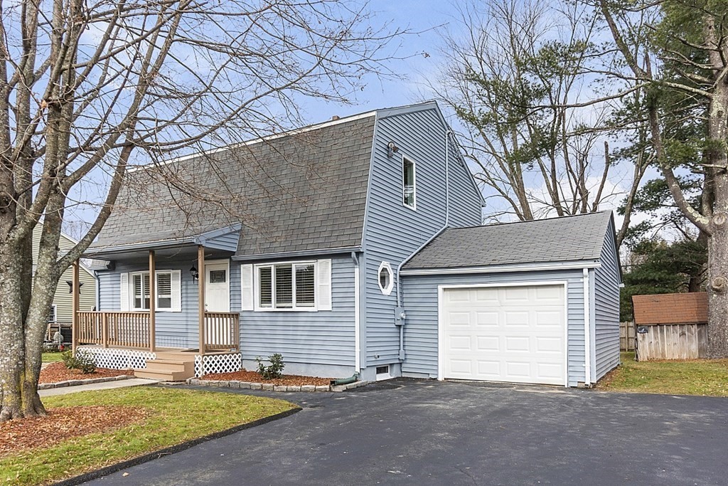 32 Elaine Street Webster, MA 01570 - Photo 3 of 42 a view of a house with a yard and large tree