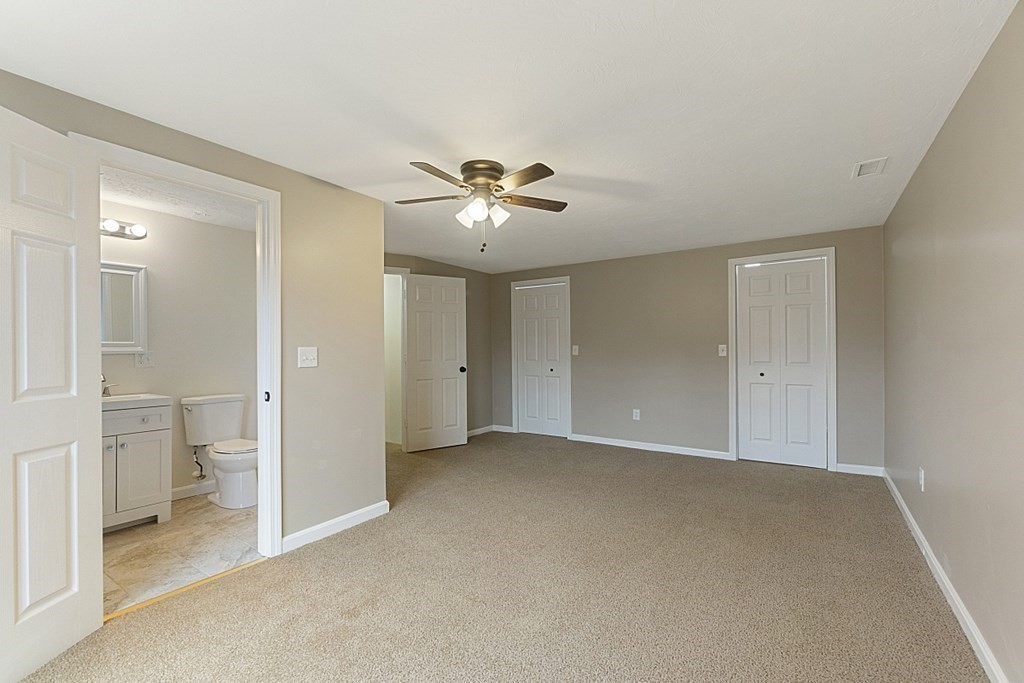 32 Elaine Street Webster, MA 01570 - Photo 33 of 42 a view of a livingroom with a ceiling fan and bathroom