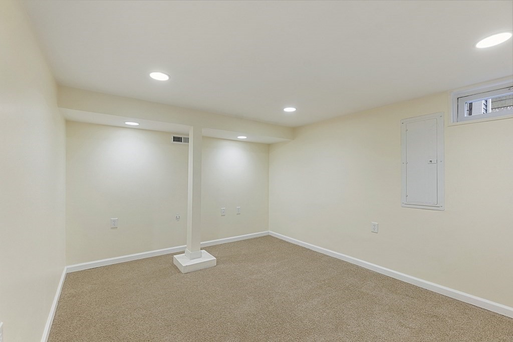 32 Elaine Street Webster, MA 01570 - Photo 35 of 42 an empty room with a workbench