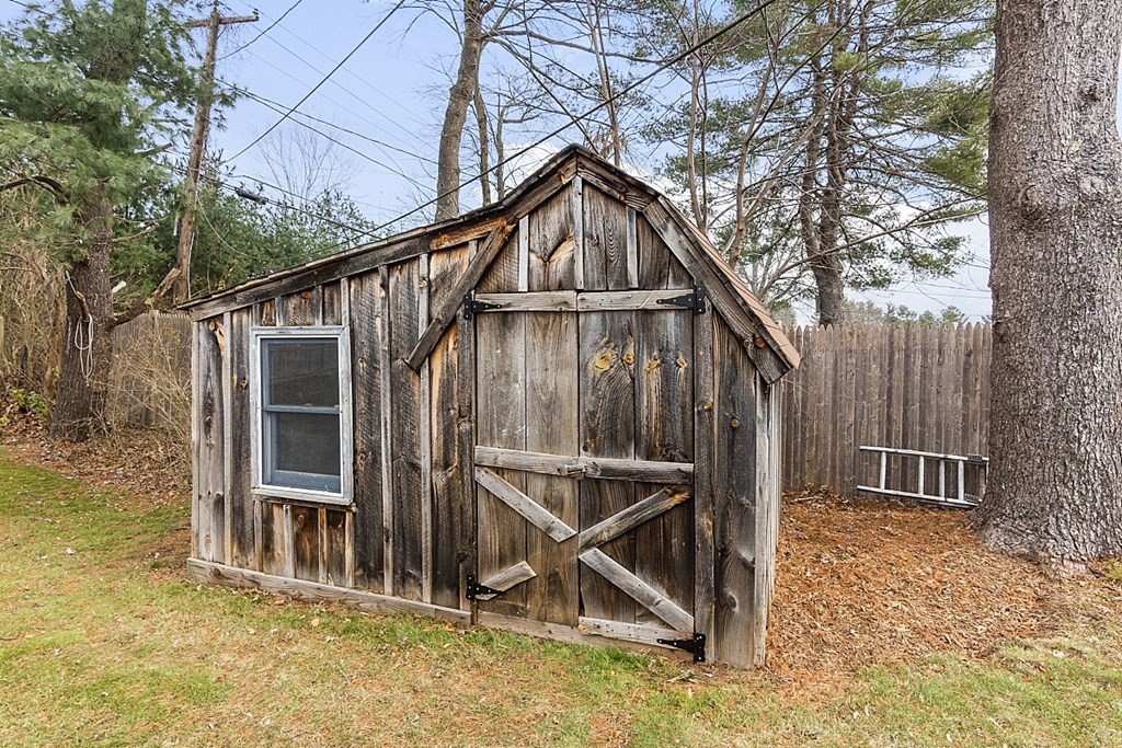 32 Elaine Street Webster, MA 01570 - Photo 8 of 42 a house with trees in front of it