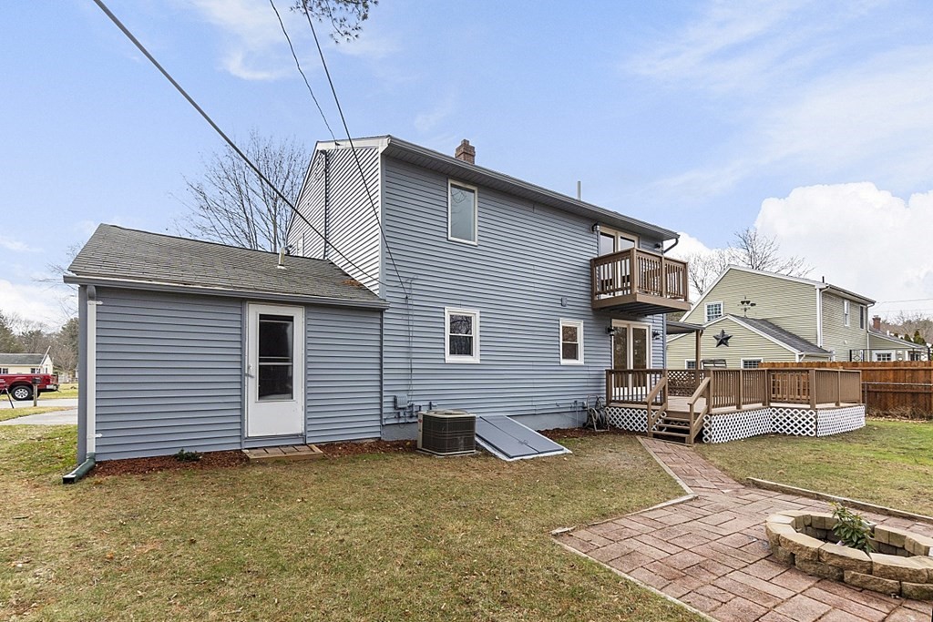 32 Elaine Street Webster, MA 01570 - Photo 9 of 42 a view of a house with a backyard