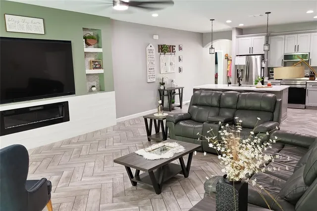 a bed room with a bed window and a television