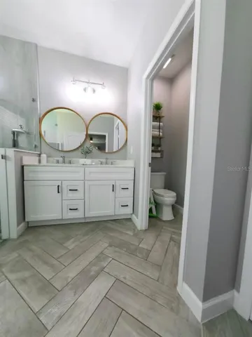 a children room with toys and a window