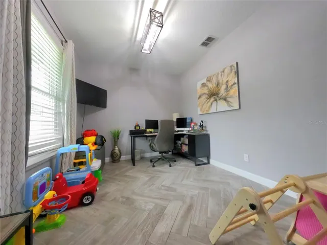 a bathroom with a sink a vanity and a mirror