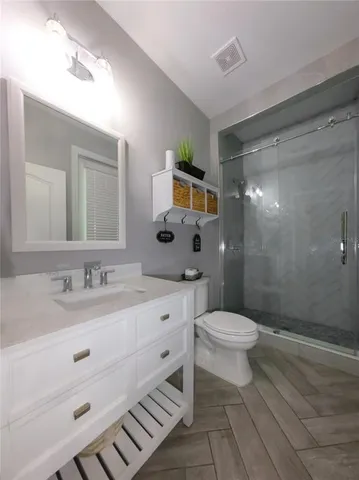 a view of a backyard with porch and furniture