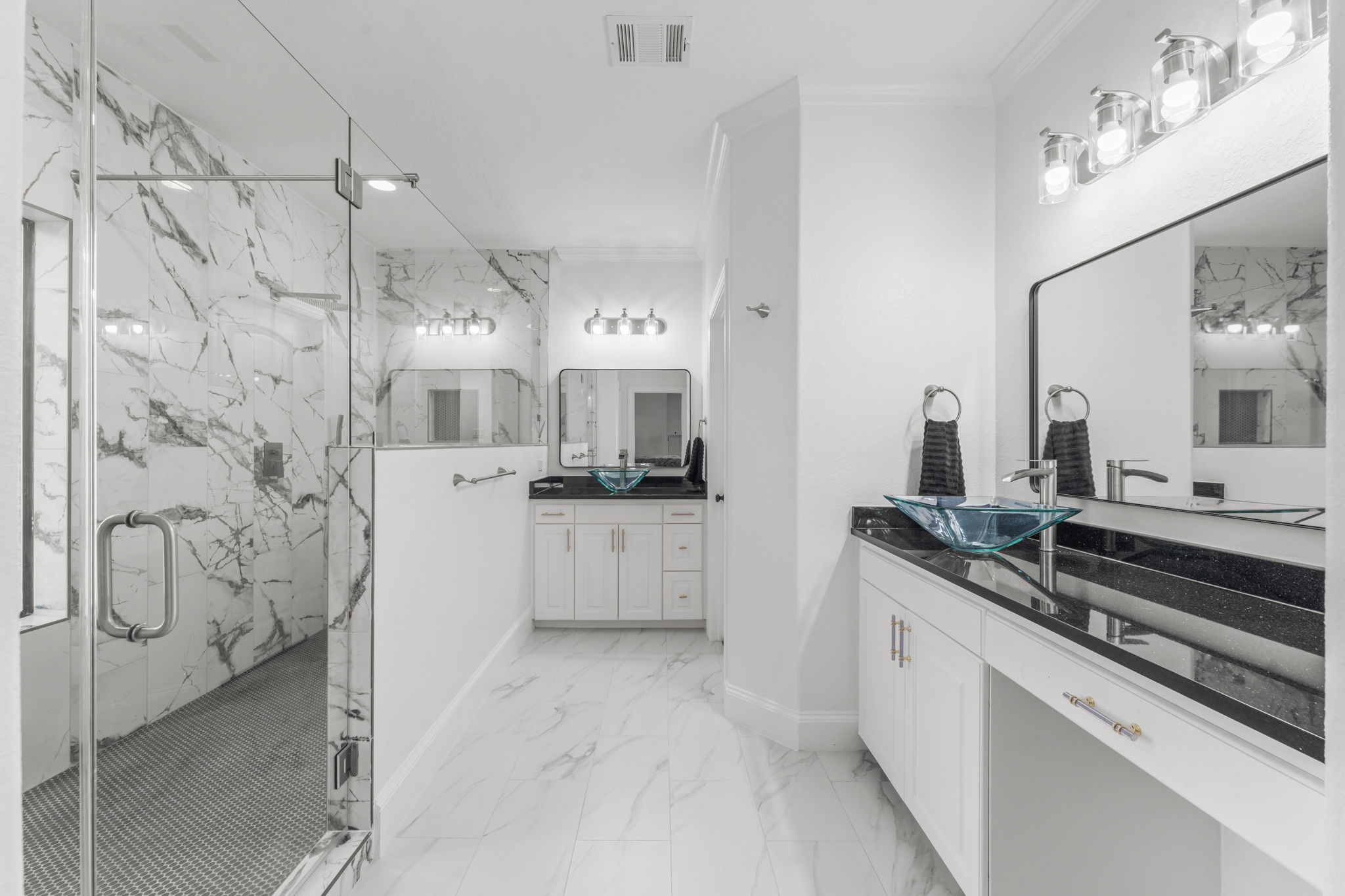 4430 Chateau Creek Way Spring, TX 77386 - Photo 33 of 46 a kitchen with white cabinets and appliances