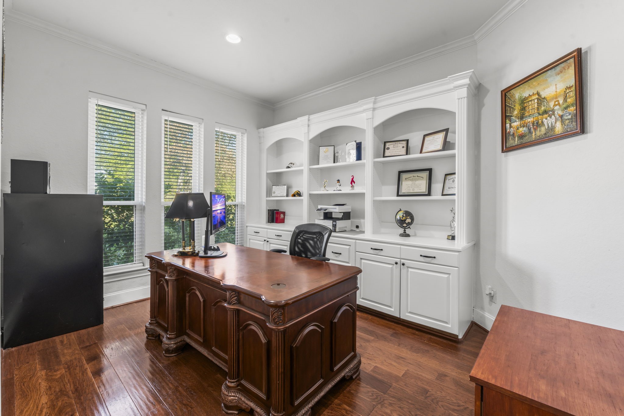 4430 Chateau Creek Way Spring, TX 77386 - Photo 6 of 46 a kitchen with sink cabinets and wooden floor